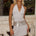 RUMI FAUX WRAP HALTER MINI DRESS - ASH